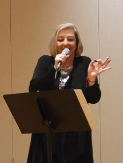 Liliana Glik performing at the presentation of Margarita Gokun Silver's book I Named My Dog Pushkin (and Other Immigrant Tales)