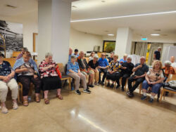 Mission to Israel. Georgy Melsky is giving a concert for evacuees at the hotel where they're living now.