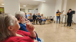 Mission to Israel. Georgy Melsky is giving a concert for evacuees at the hotel where they're living now.
